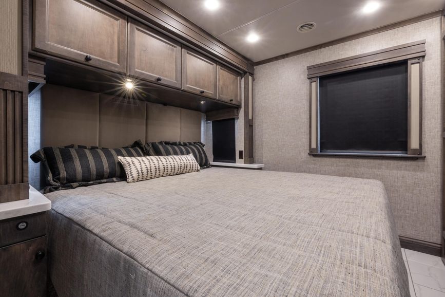 Inside image of the 2025 Tiffin Allegro Bay bedroom