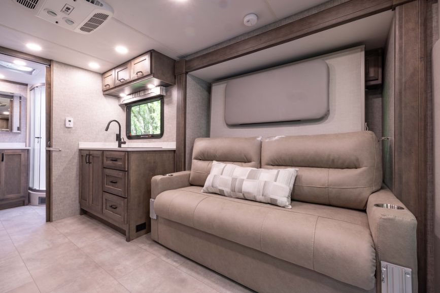 Sofa, seating, and window in the Midas