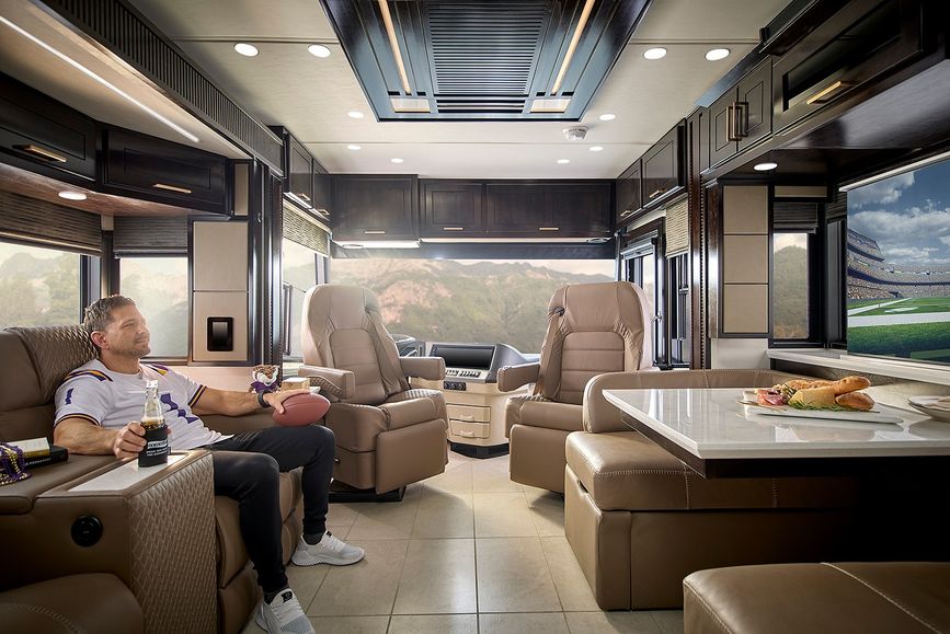 2027 Newmar New Aire living area with a person in a chair