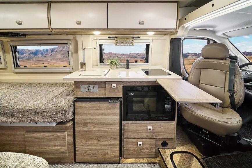 Travato driver's seat swivels into the living space