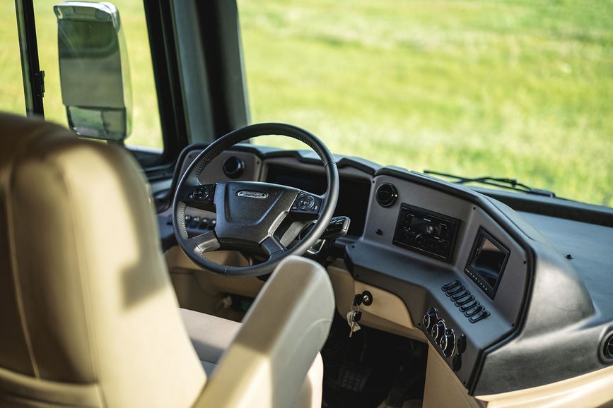 Drivers&#039; seat and dashboard aboard the Allegro RED