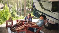Couple enjoying the outdoors next to a Wayfarer