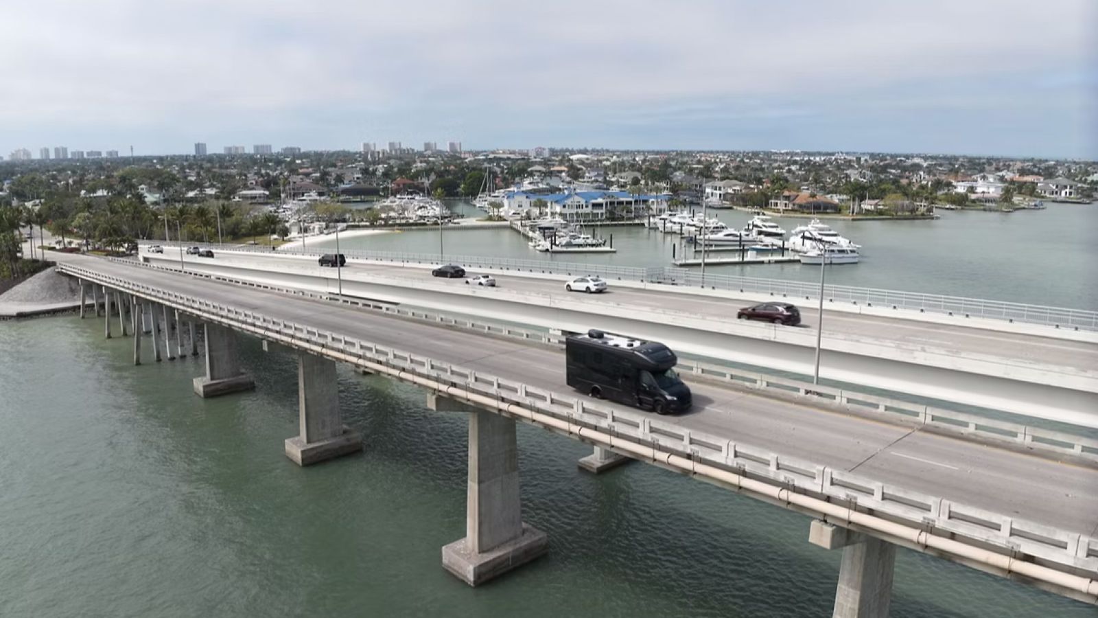 RV driving over a bridge