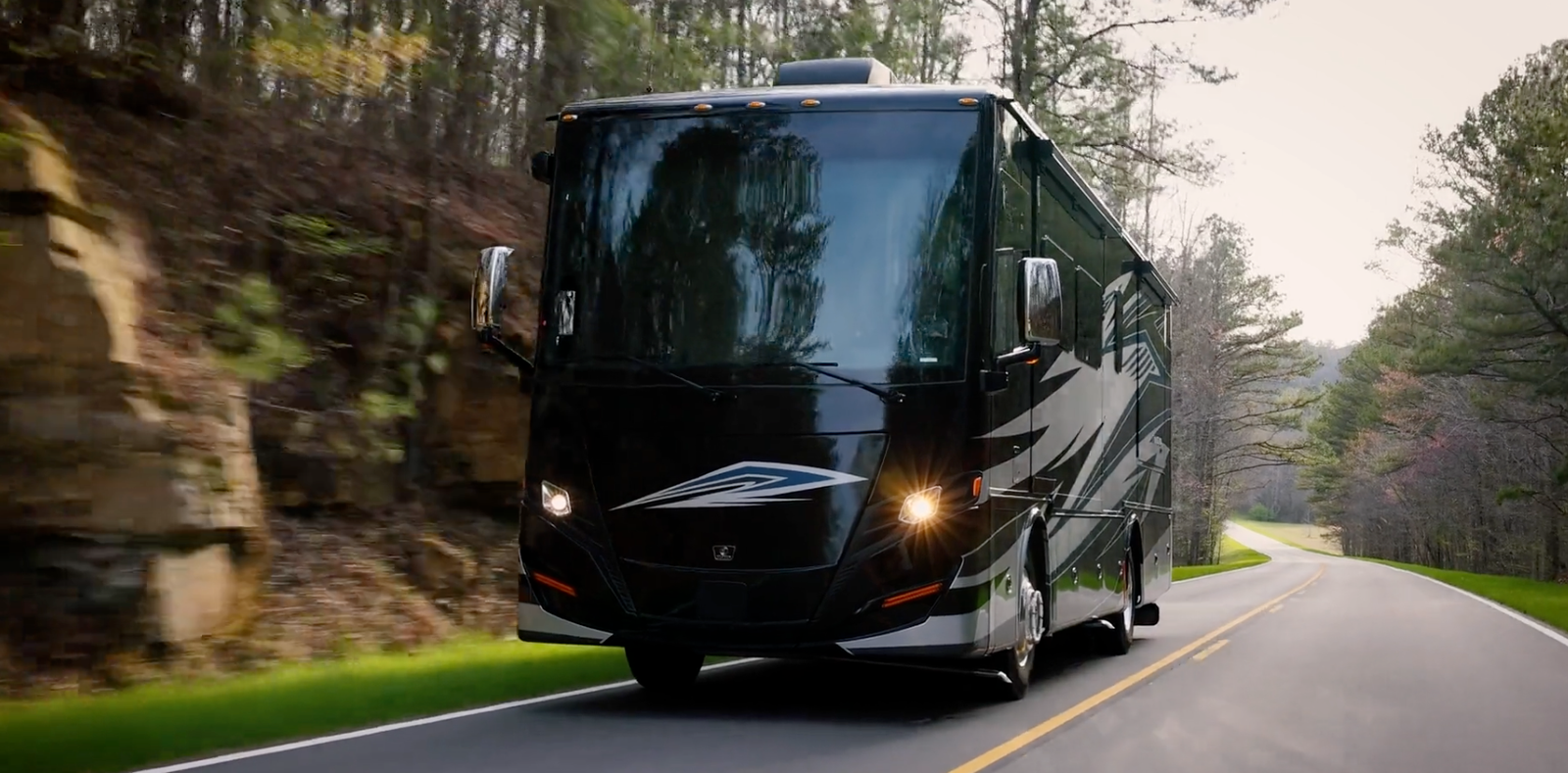 Allegro RED driving alongside a mountain