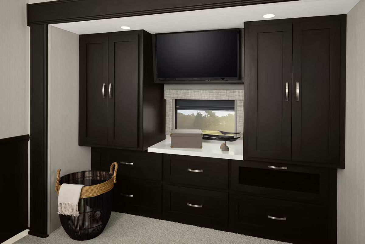 Large black RV dresser with a window cutout