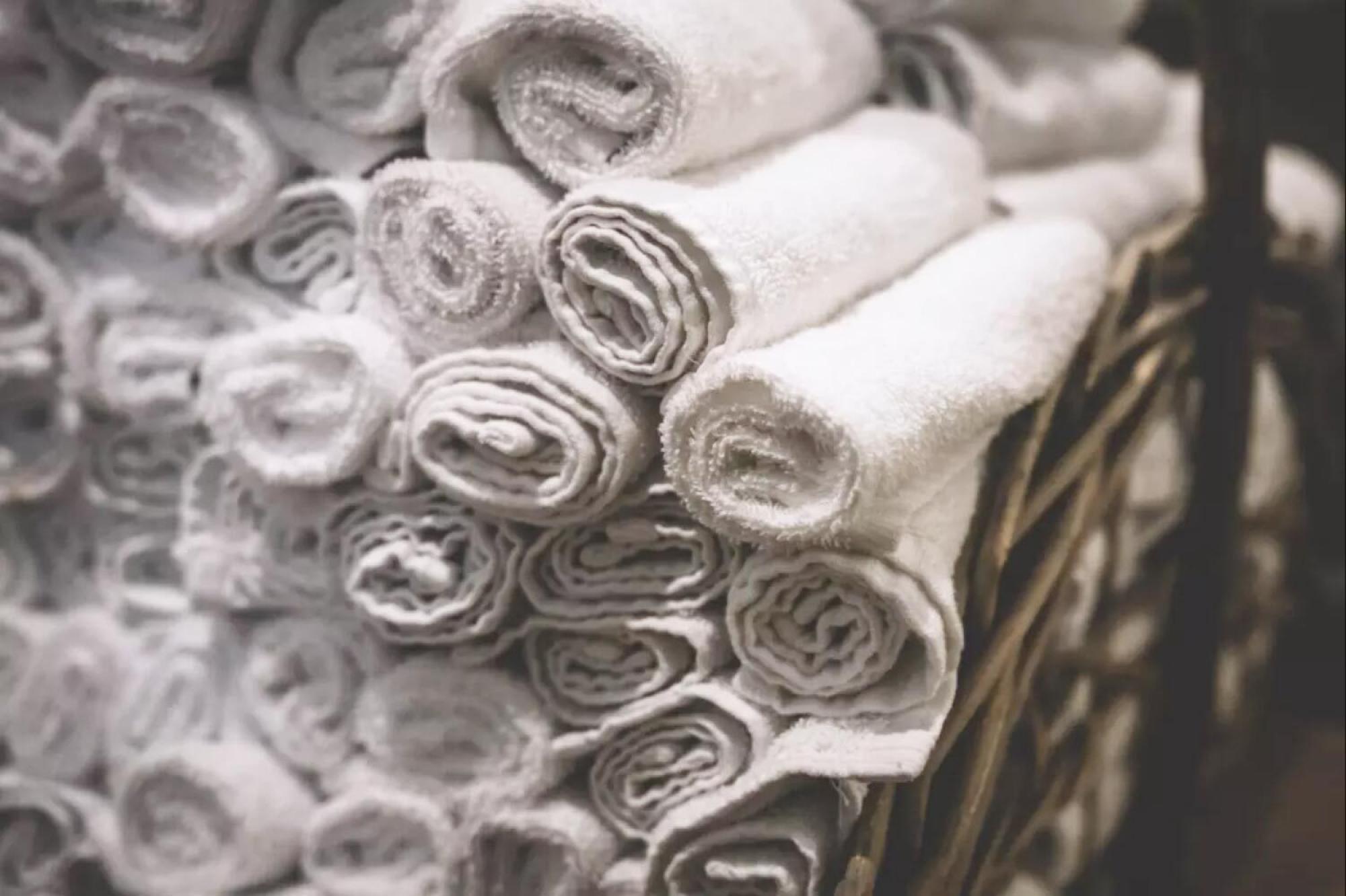 A PIle of Rolled-Up Laundry Towels